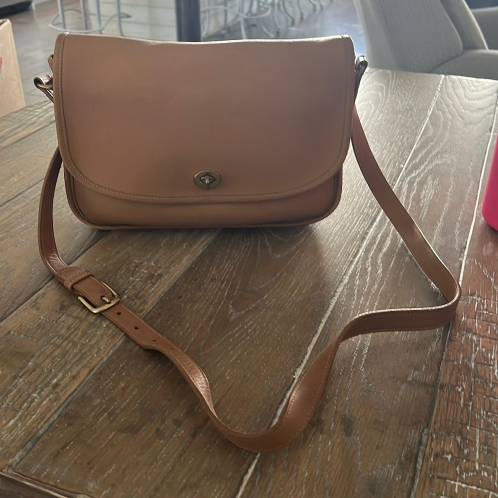 Medium size, tan leather Coach handbag